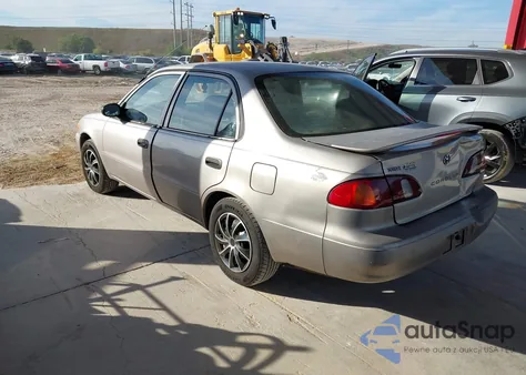 2000 Toyota Corolla Ve из США, поврежденный, VIN 1NXBR12E1YZ391818